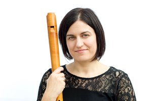 Photo of Celia Ireland holding a recorder