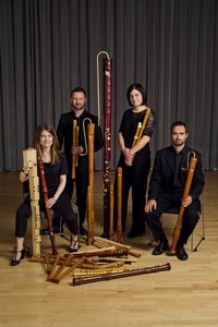 The Flautdors in a rehearsal studio with numerous instruments of different kinds