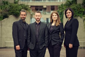 The Flautadors group shot with the Barbican centre in the background